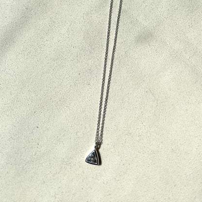 A classic trillion diamond pendant necklace with a white gold chain.