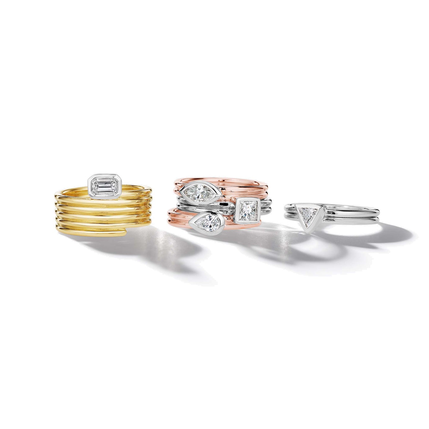 East/West Emerald Cut Diamond Bezel Ring